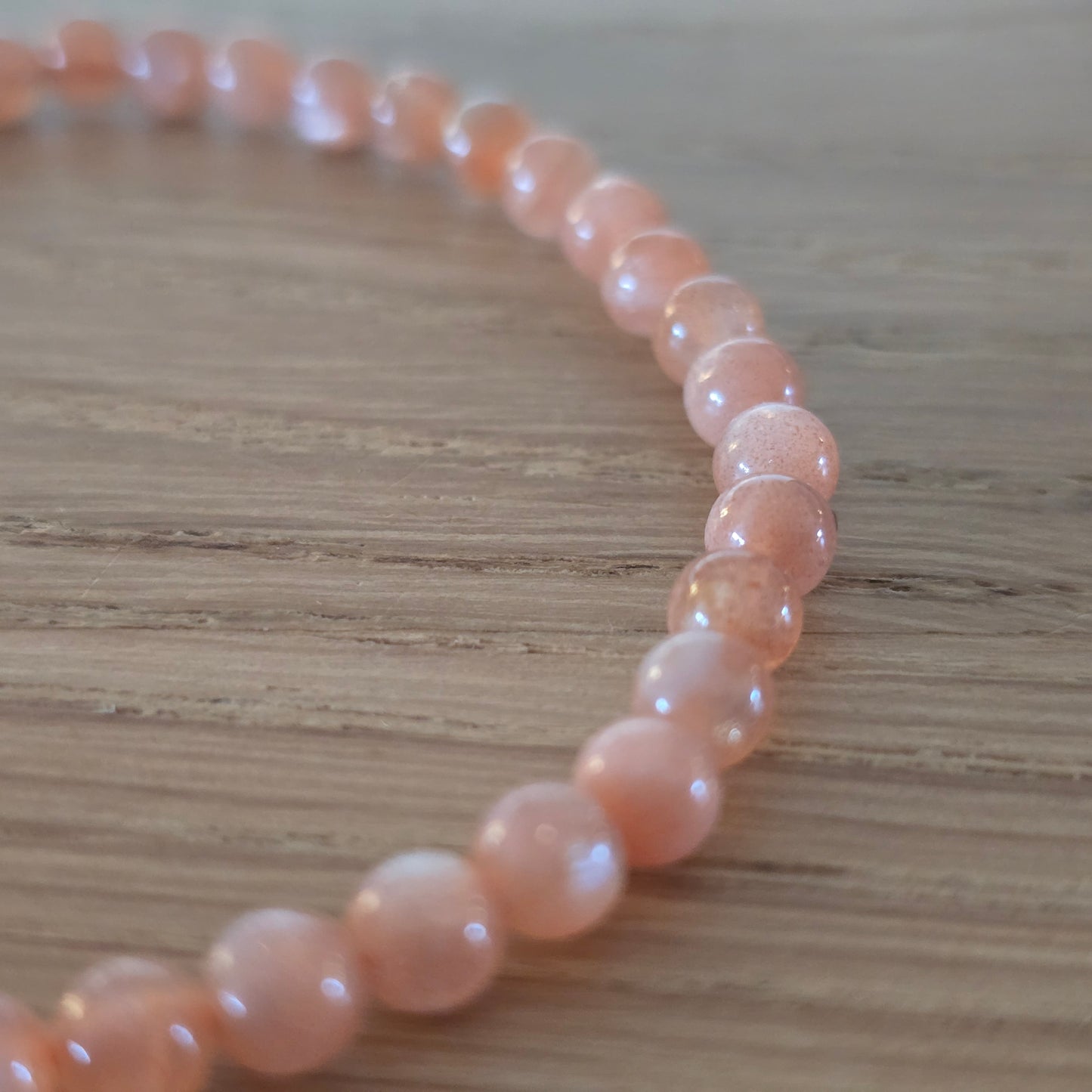 Zonnesteen Kogelarmband · 4 mm · Elastiek