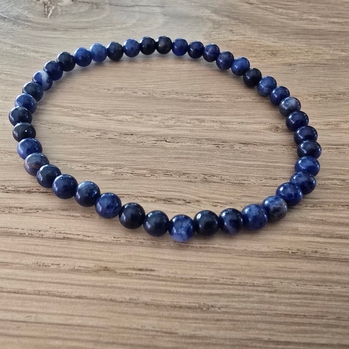 Sodaliet Kogelarmband · 4 mm · Elastiek