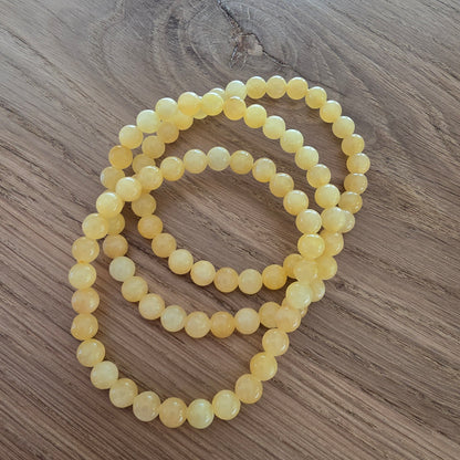 Gele Jade Kogelarmband · 6 mm · Elastiek