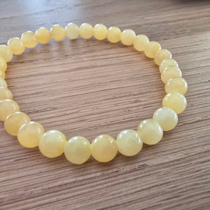 Gele Jade Kogelarmband · 6 mm · Elastiek