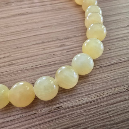Gele Jade Kogelarmband · 6 mm · Elastiek