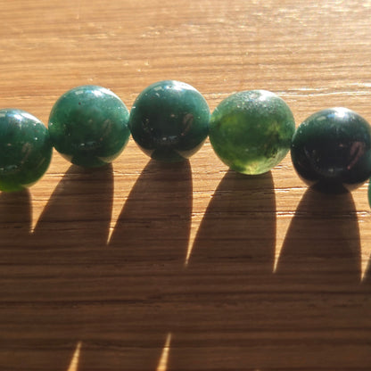 Mosagaat Kogelarmband · 8 mm · Elastiek