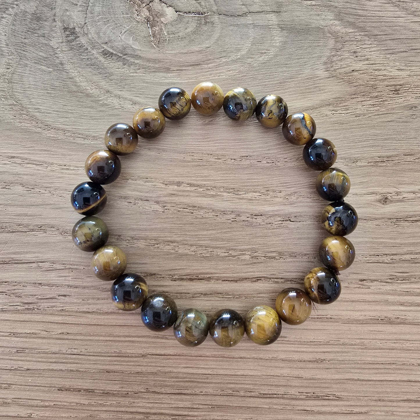 Tijgeroog Kogelarmband · 8 mm · Elastiek