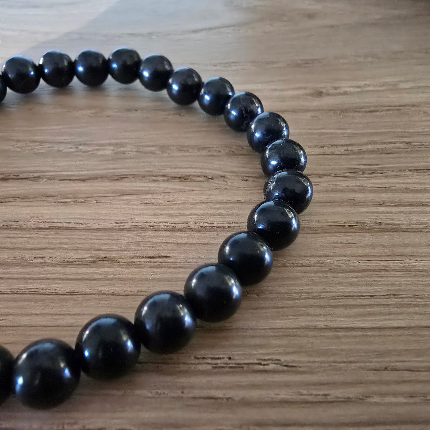 Shungiet Kogelarmband · 6 mm · Elastiek