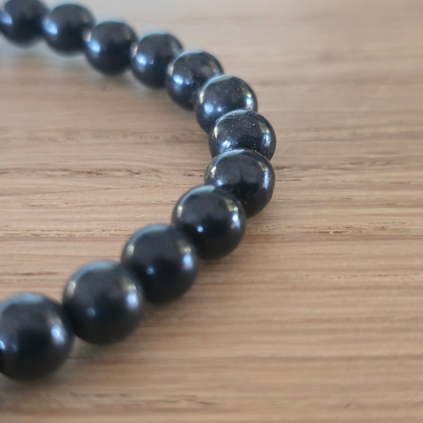Shungiet Kogelarmband · 6 mm · Elastiek