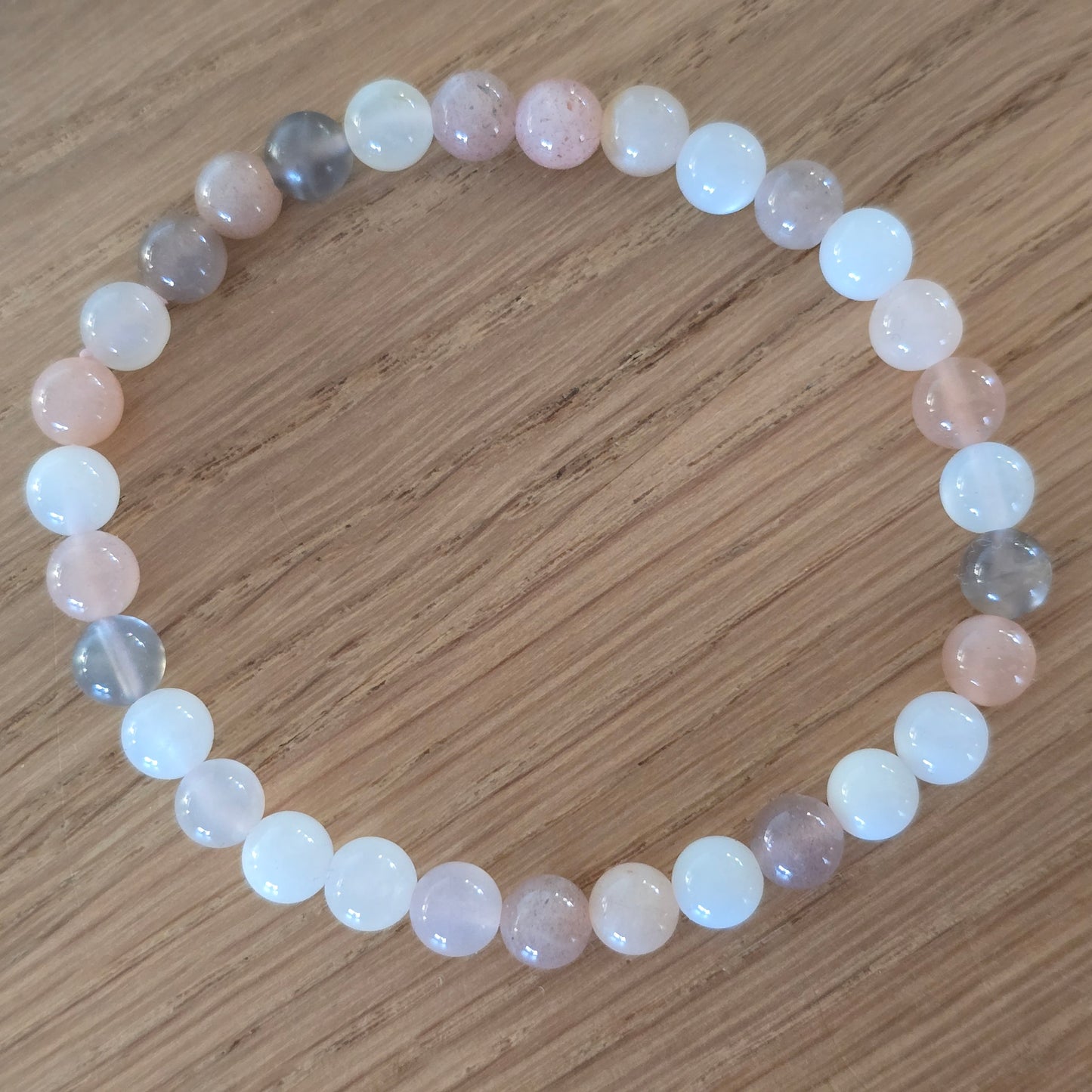 Multicolor Maansteen Kogelarmband · 6 mm · Elastiek