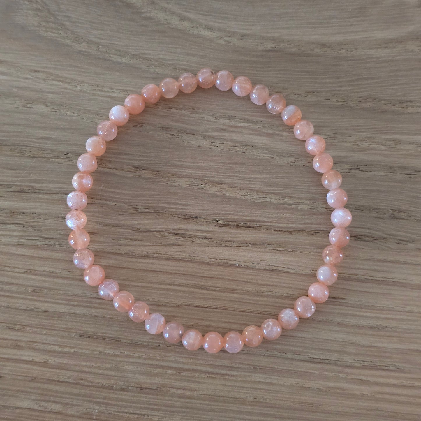 Zonnesteen Kogelarmband · 4 mm · Elastiek