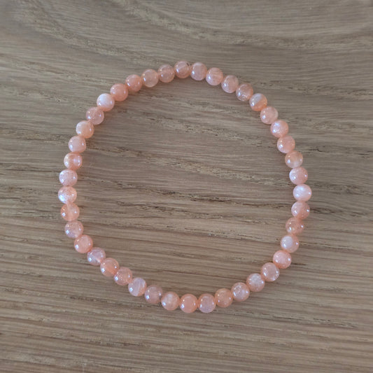 Zonnesteen Kogelarmband · 4 mm · Elastiek