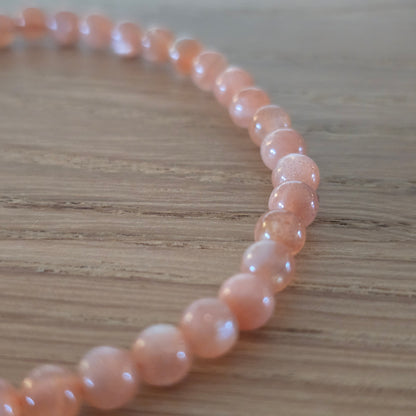Zonnesteen Kogelarmband · 4 mm · Elastiek