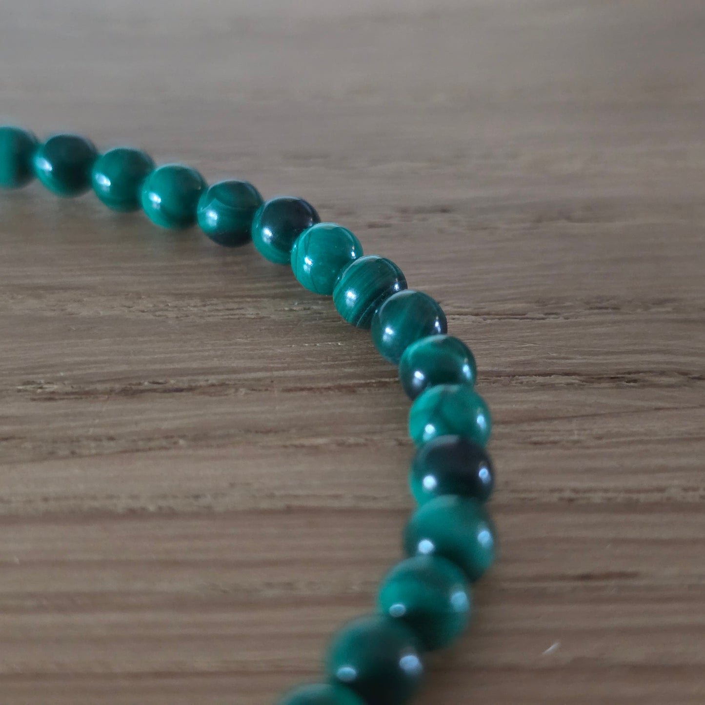 Malachiet Kogelarmband · 4 mm · Elastiek