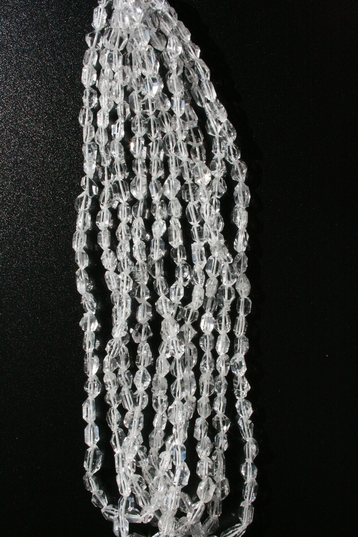Bergkristal kralenstreng van ongeveer 40 cm met kristalachtige punten