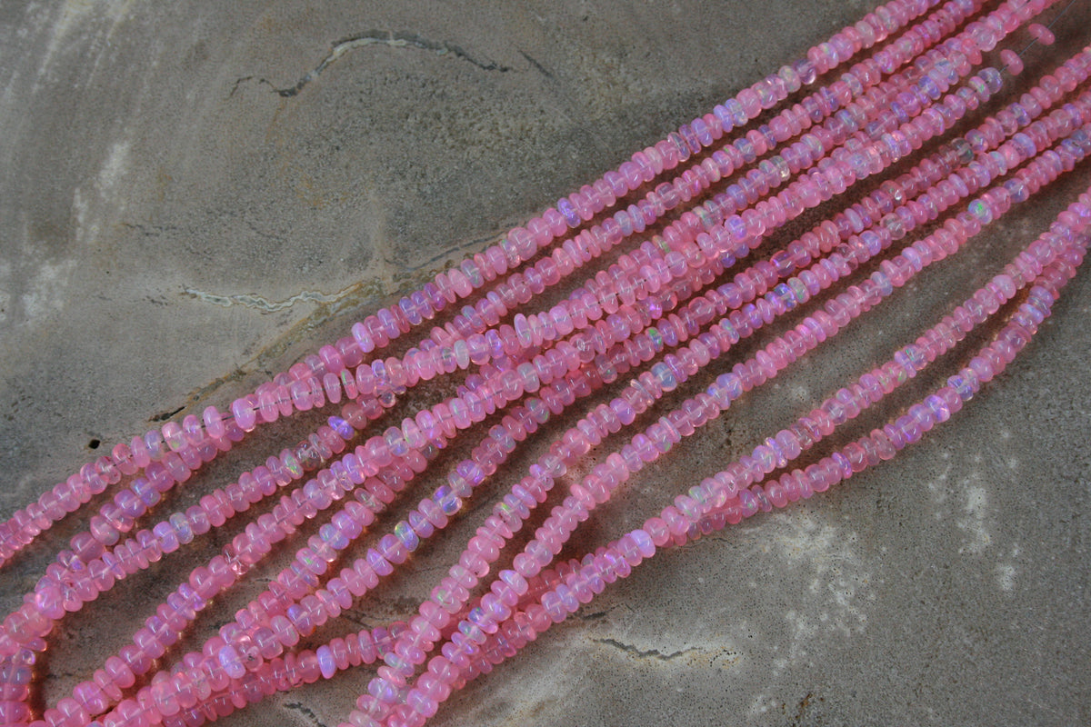 Roze opaal rondellen op een streng van ongeveer 42 cm