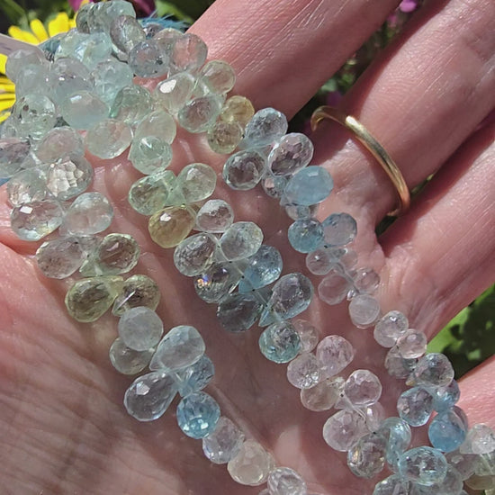 Video van facet geslepen beryl drops met natuurlijke variatie