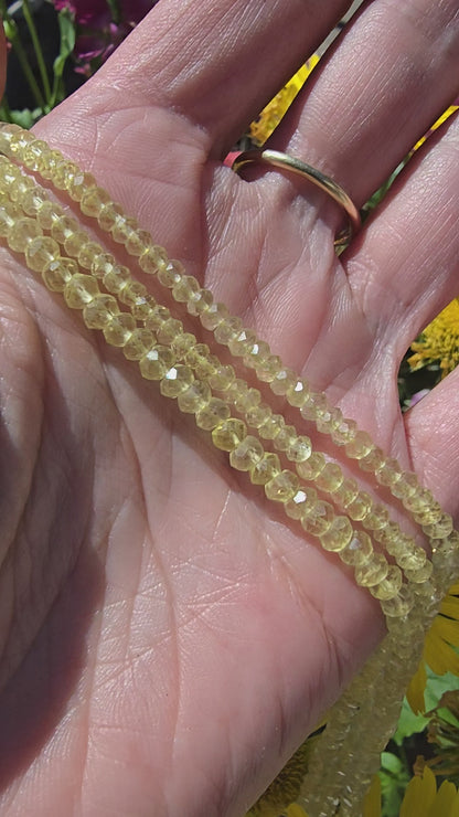 Video van facetgeslepen lemon kwarts rondellen met natuurlijke variatie